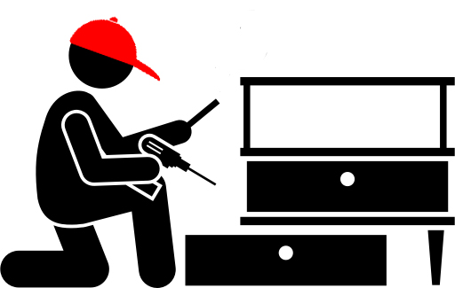 Person assembling furniture with screwdriver.